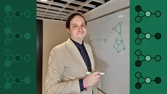 Image of a mathematician standing at a whiteboard with graphs, the photo has a green frame with numerous graphs